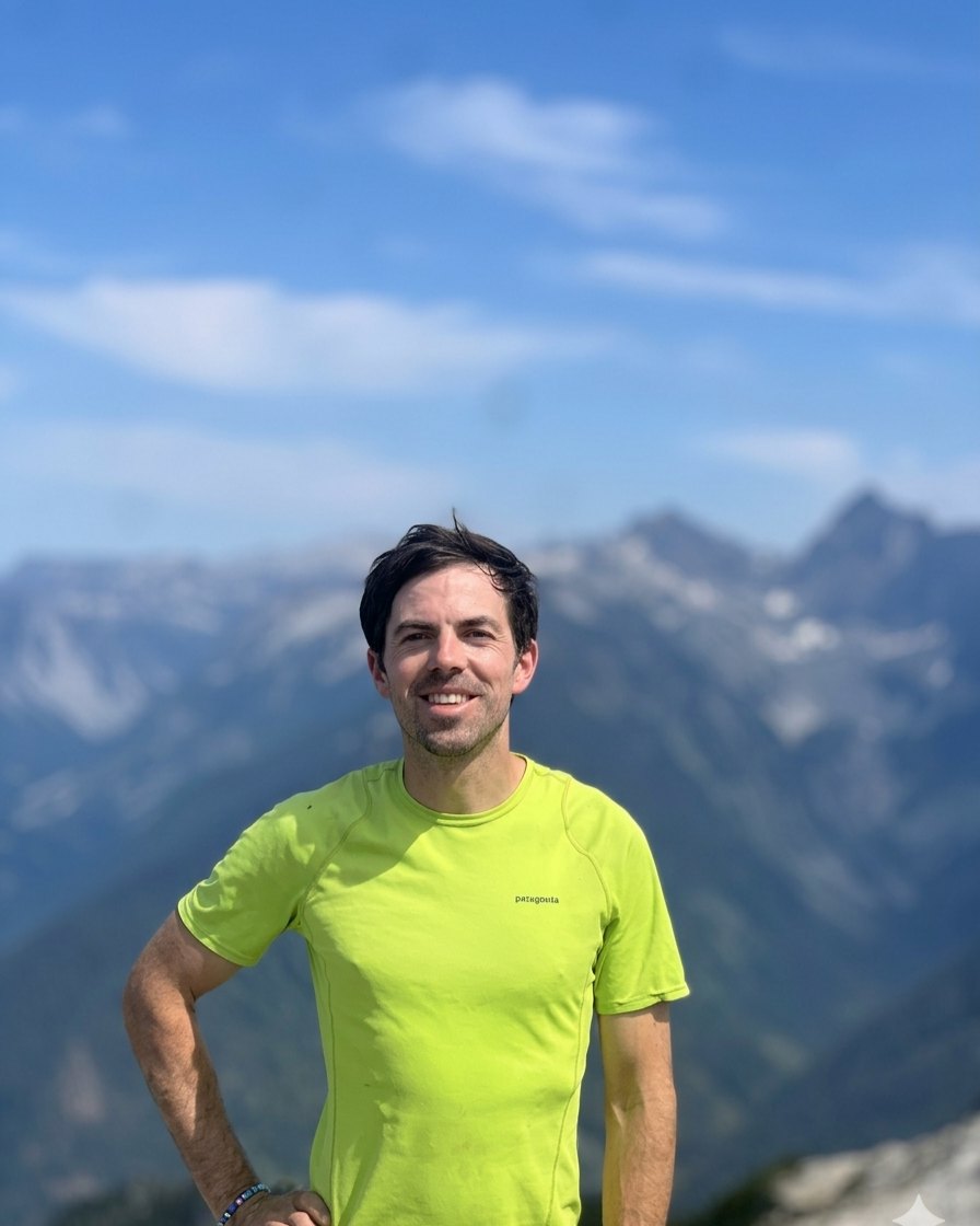 Kyle Huber on a mountain summit